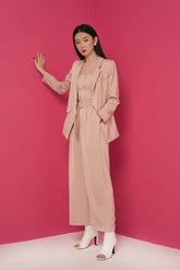 Tailored silk crop top with structured double-breasted button front and sleek minimalist fit